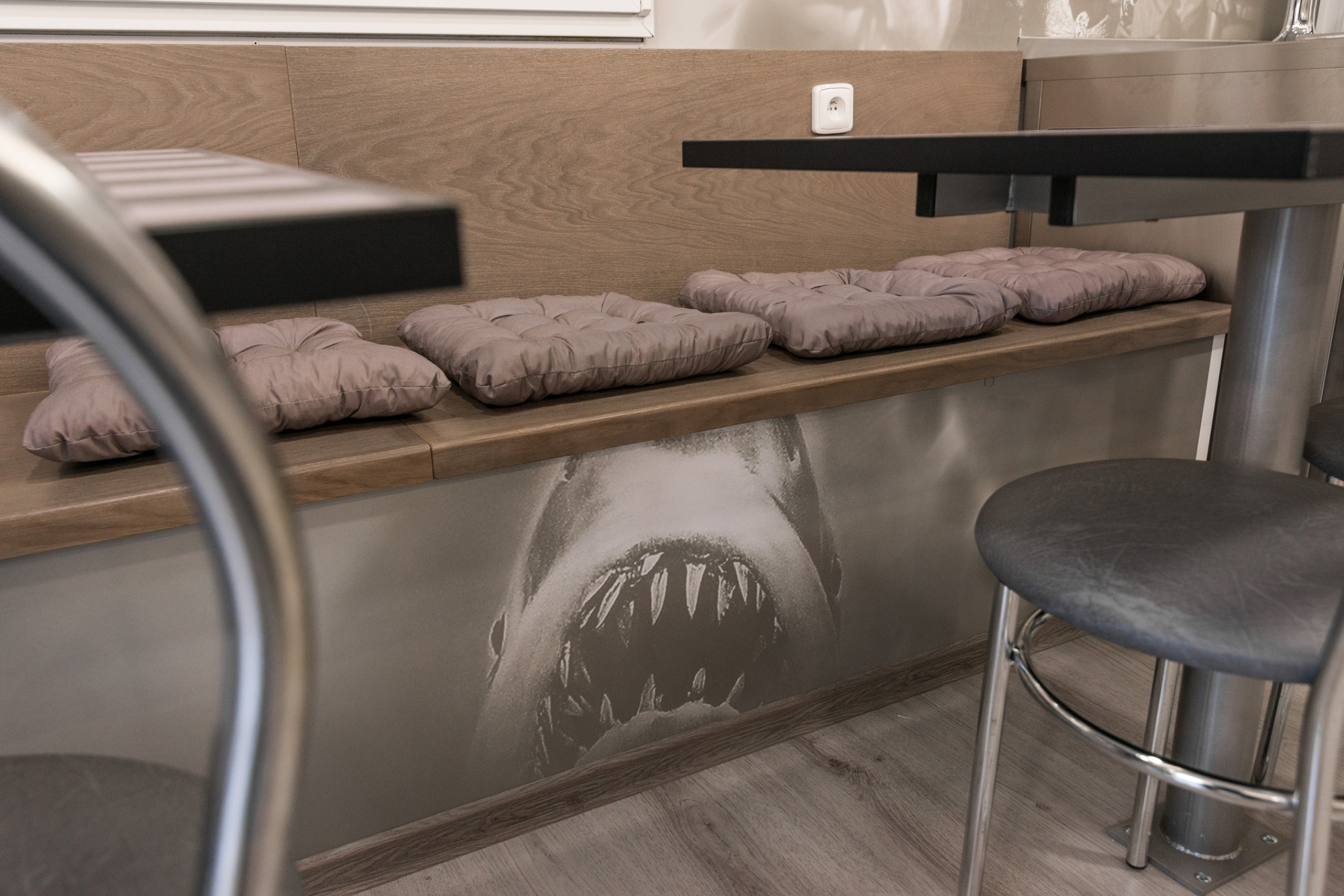 Detail of a bench wrap featuring Jaws.