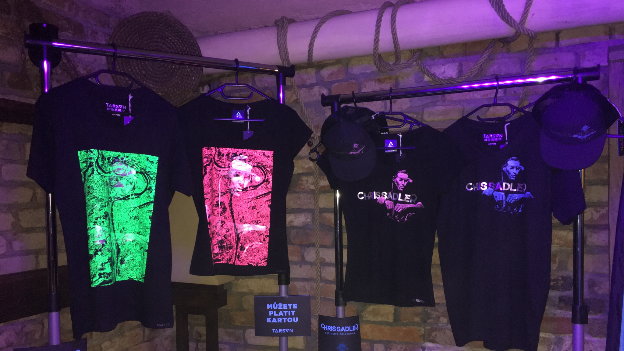 Finished prints displayed under UV lighting.